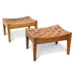 A PAIR OF ARTS AND CRAFTS OAK STOOLS, BY ARTHUR SIMPSON
