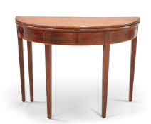 A GEORGE III MAHOGANY DEMILUNE TEA TABLE