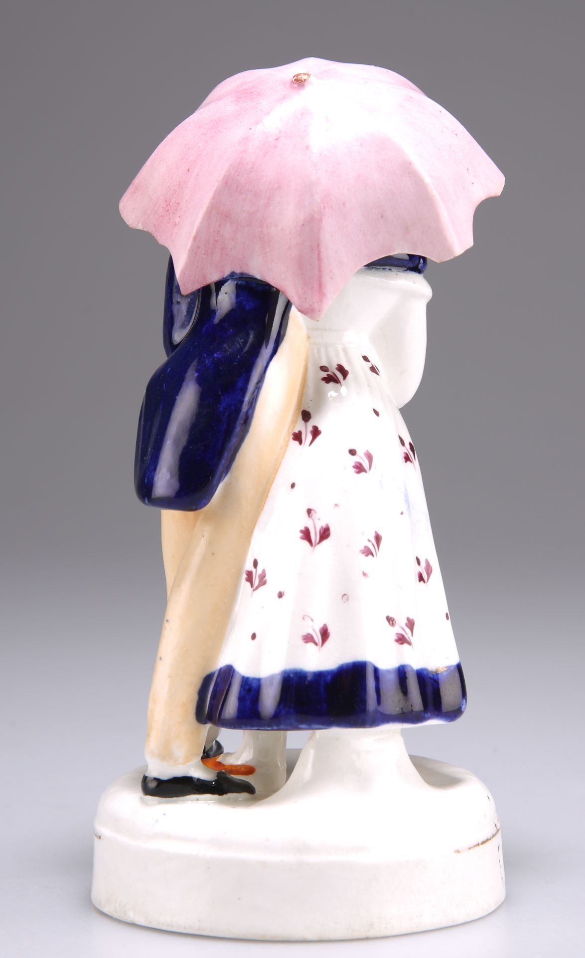 A STAFFORDSHIRE PORCELLANEOUS FIGUR, "UMBRELLA COURTSHIP" - Image 2 of 2