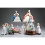 EIGHT ROYAL DOULTON FIGURES