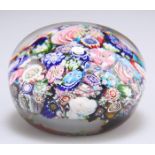 A SIGNED CLICHY CLOSE-PACKED MILLEFIORI PAPERWEIGHT, CIRCA 1850
