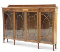 AN EDWARDIAN INLAID MAHOGANY BREAKFRONT BOOKCASE