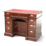 A LIMITED EDITION MAHOGANY KNEEHOLE DESK AND CHAIR