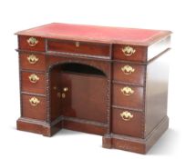 A LIMITED EDITION MAHOGANY KNEEHOLE DESK AND CHAIR