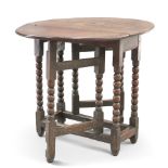 A SMALL 18TH CENTURY OAK GATELEG TABLE