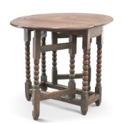 A SMALL 18TH CENTURY OAK GATELEG TABLE