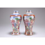 A NEAR PAIR OF CHINESE PORCELAIN VASES