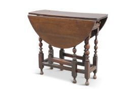 A SMALL 18TH CENTURY OAK GATELEG TABLE