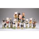 A BESWICK TWELVE-PIECE PIG BAND