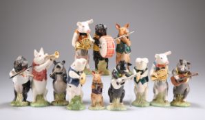 A BESWICK TWELVE-PIECE PIG BAND