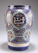 A LARGE PERSIAN TIN-GLAZED EARTHENWARE VASE