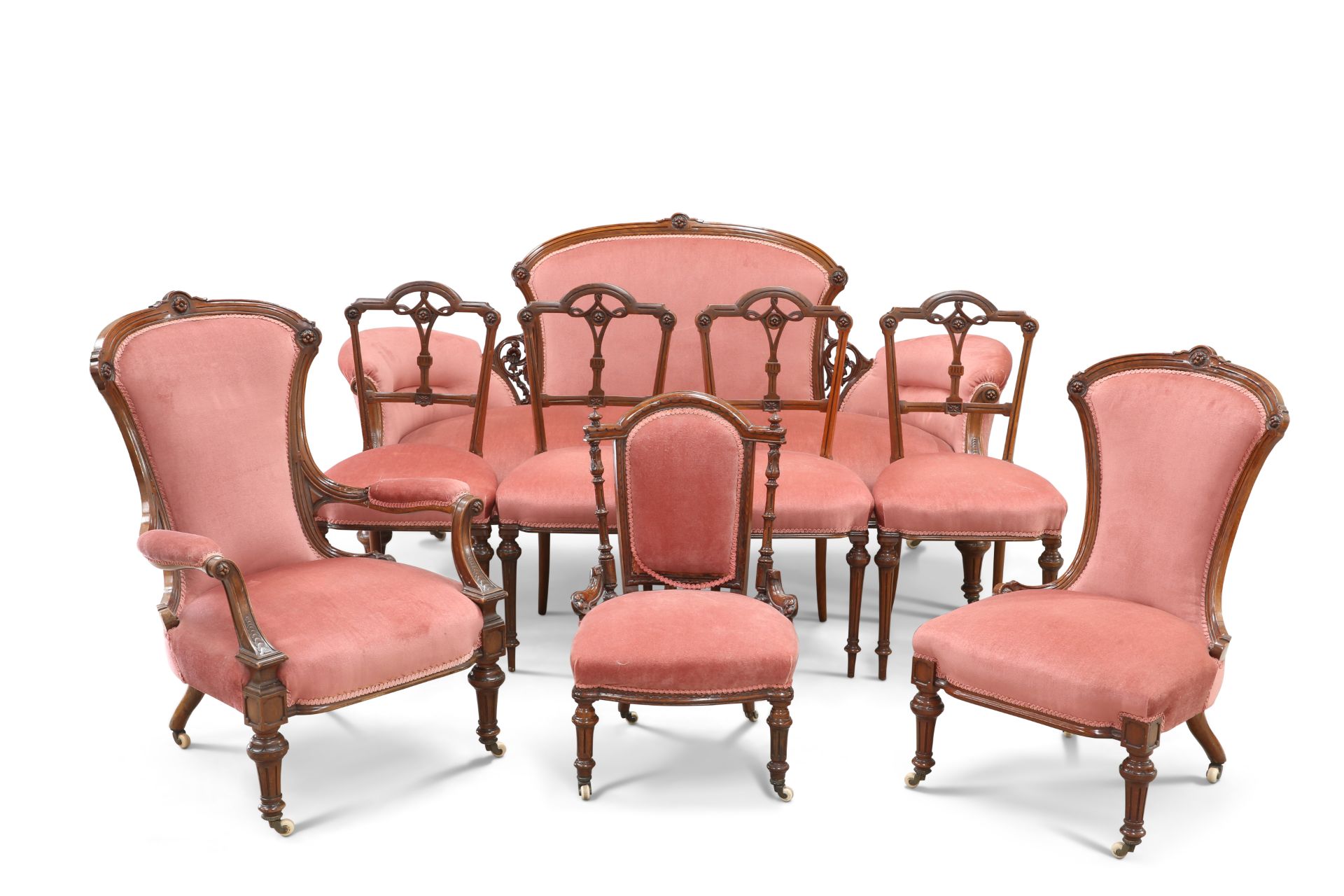 A VICTORIAN WALNUT EIGHT-PIECE PARLOUR SUITE