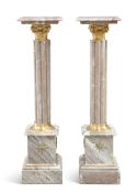 A PAIR OF GILT-METAL MOUNTED MARBLE TORCHÉRE STANDS