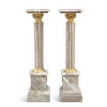 A PAIR OF GILT-METAL MOUNTED MARBLE TORCHÉRE STANDS