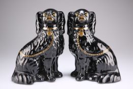 A PAIR OF VICTORIAN STAFFORDSHIRE MODELS OF SEATED SPANIELS