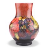 WALTER MOORCROFT AN ANEMONE PATTERN FLAMBÉ POTTERY VASE