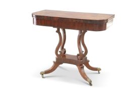 A REGENCY MAHOGANY FOLDOVER CARD TABLE