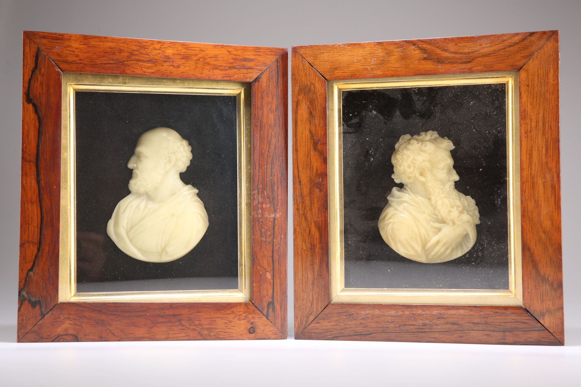 A PAIR OF EARLY 19TH CENTURY WAX PROFILE PORTRAITS