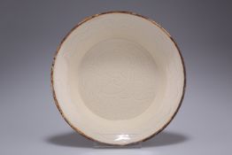 A CHINESE DING WARE DISH