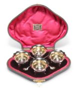 A SET OF FOUR EDWARDIAN SILVER SALTS