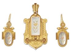 A VICTORIAN ETRUSCAN REVIVAL LOCKET PENDANT AND EARRINGS SUITE