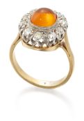 A FIRE OPAL AND DIAMOND CLUSTER RING