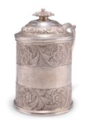 AN INDIAN COLONIAL SILVER MUG AND COVER