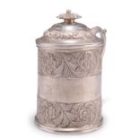 AN INDIAN COLONIAL SILVER MUG AND COVER