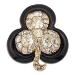 A VICTORIAN BLACK ENAMEL AND DIAMOND CLOVER BROOCH