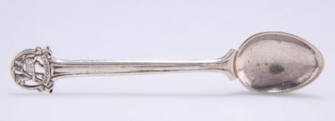 A GEORGE V SILVER REGIMENTAL COFFEE SPOON