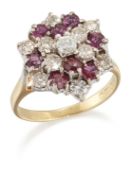 AN 18 CARAT GOLD RUBY AND DIAMOND CLUSTER RING