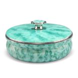 AN ART DECO SILVER AND GREEN ENAMEL POWDER BOX