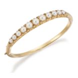 A LATE VICTORIAN SPLIT PEARL AND DIAMOND BANGLE