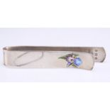 AN EDWARDIAN SILVER AND ENAMEL NAPKIN HOLDER