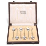 A SET OF ARTS AND CRAFTS SILVER TEASPOONS