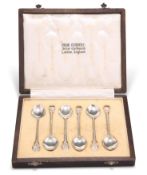 A SET OF ARTS AND CRAFTS SILVER TEASPOONS