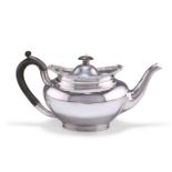 AN EDWARDIAN SILVER TEAPOT