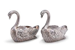 A PAIR OF EDWARDIAN HEAVY CAST SILVER SALTS