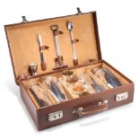 A VINTAGE LEATHER-CASED SILVER-PLATED TRAVELLING COCKTAIL SET