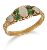 AN EMERALD AND OPAL RING