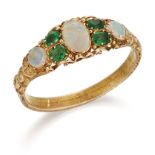 AN EMERALD AND OPAL RING