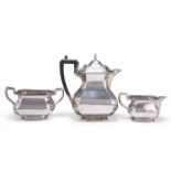 A GEORGE V SILVER THREE-PIECE TEA SERVICE