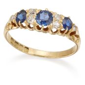 AN 18 CARAT GOLD SAPPHIRE AND DIAMOND CLUSTER RING