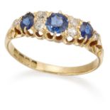 AN 18 CARAT GOLD SAPPHIRE AND DIAMOND CLUSTER RING