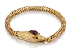 A VICTORIAN GARNET SNAKE BRACELET