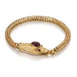 A VICTORIAN GARNET SNAKE BRACELET