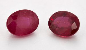 TWO OVAL MIXED-CUT RUBIES, 1.40ct and 1.77ct