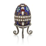 A SMALL RUSSIAN SILVER AND ENAMEL EGG