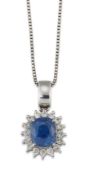 A SAPPHIRE AND DIAMOND CLUSTER PENDANT ON CHAIN