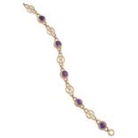 A 9 CARAT GOLD AMETHYST BRACELET